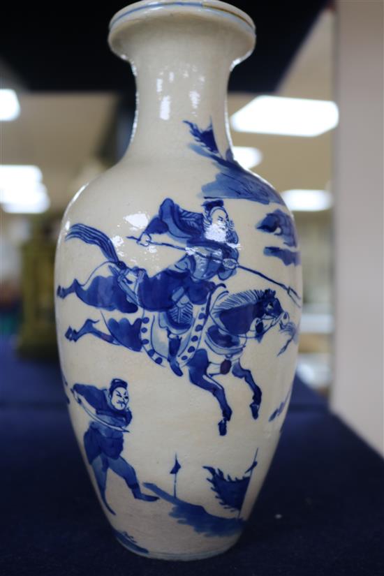 A Chinese blue and white soft paste porcelain vase, 18th century, with a Kangxi mark, 18cm